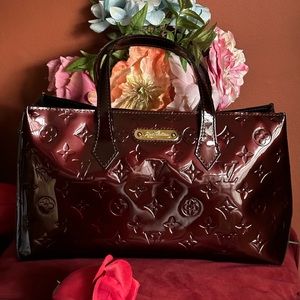 Pre owned authentic Vuitton patent leather bag